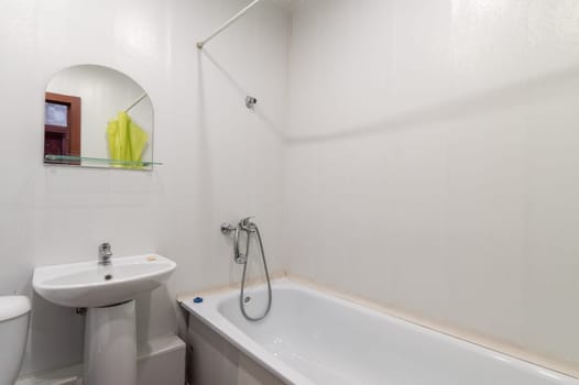 Russia, Moscow- June 10, 2019: interior room apartment. standard repair decoration in hostel. bathroom and toilet