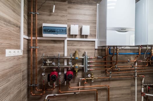 Russia, Moscow- June 11, 2019: interior room apartment. boiler room. heating system, pipes and appliances