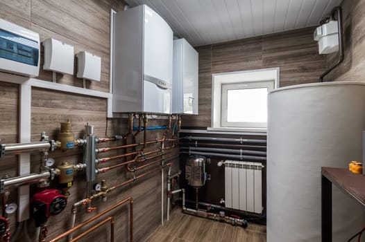 Russia, Moscow- June 11, 2019: interior room apartment. boiler room. heating system, pipes and appliances