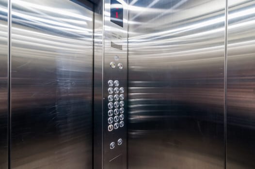 Russia, Moscow- June 11, 2019: interior room apartment. standard repair decoration in hostel. passenger elevator in an apartment building, buttons