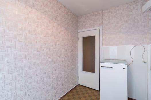 Russia, Moscow- June 11, 2019: interior room apartment. standard repair decoration in hostel. modern kitchen, dining area