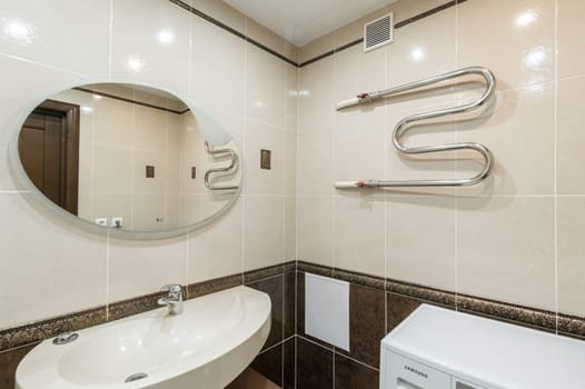 Russia, Moscow- June 11, 2019: interior room apartment. modern bathroom, sink, decoration elements, toilet