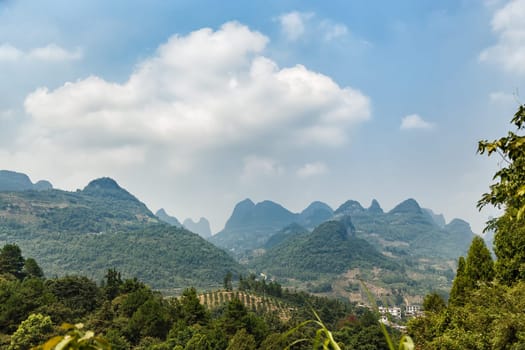 View of the scenic Guilin Mountains on a clear day, Yangshuo, China