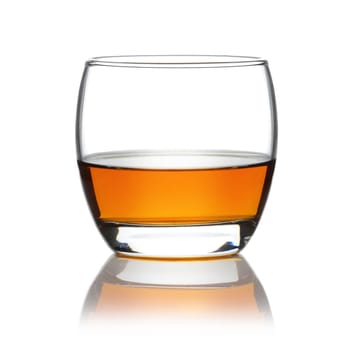 A Scotch in a round tumbler isolated on white