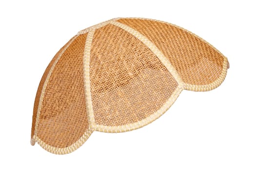 Lamp shade isolated. Close-up of vintage wicker lamp shade in side view isolated on a white background. Interior decoration element.