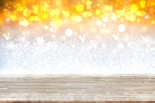 Empty table top or wood floor on abstract christmas background. Empty rustic wooden table top with snow over abstract light white gold winter landscape. Template for product display montage.