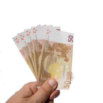 Human hand holding euro money. Isolated on white background.