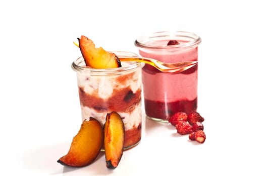 Quark dessert with fruits arranged in a glass