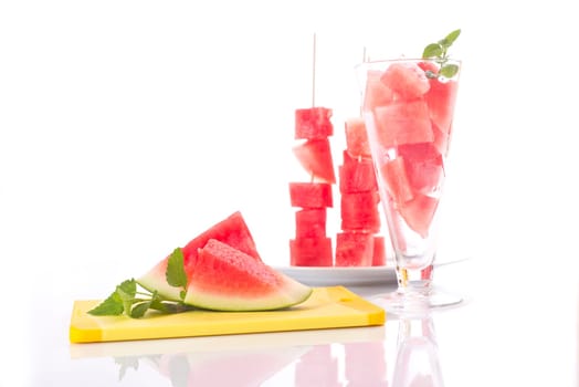 diced melon, watermelon on bright background