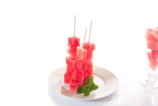 diced melon, watermelon on bright background