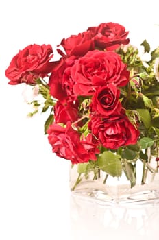 Rose bouquet with red and pink roses in glass vase