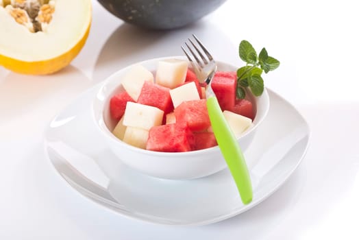 diced melon, watermelon on bright background
