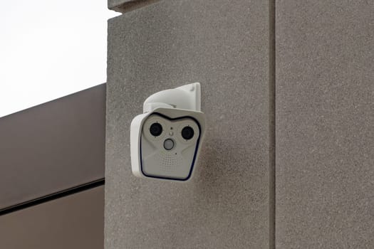 Electric camera on house facade in Detail
