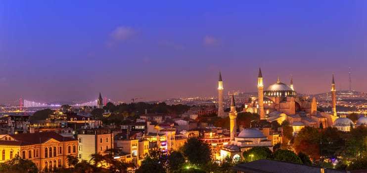 Istanbul night panorama, view on the Hagia Sophia Museum and the Bosphorus bridge, Turkey.