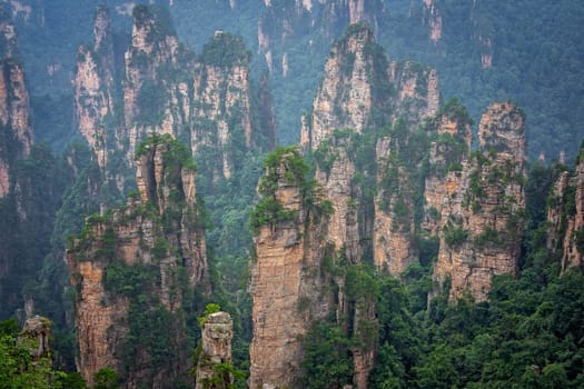 Panoramic view of the stone pillars of Tianzi mountains in Zhangjiajie National park, a famous tourist attraction, Wulingyuan, Hunan Province, China