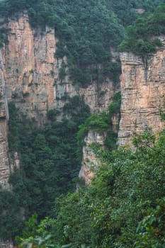 View from the scenic platform over the Tian Qiao or the Greatest Natural Bridge in Yuanjiajie scenic area, Zhangjiajie Forest Park, Hunan province, China