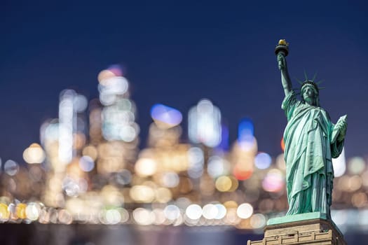 Statue of Liberty with New York Mid town blurred background