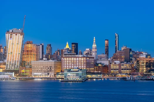 Aerial view of New York city Mid town Skylines cityscape from New Jersey at dusk