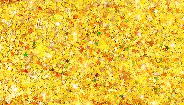 Five pointed star shape golden sparkles textured background