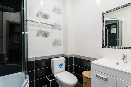 Russia, Moscow- June 11, 2019: interior room apartment. standard repair decoration in hostel. bathroom and toilet
