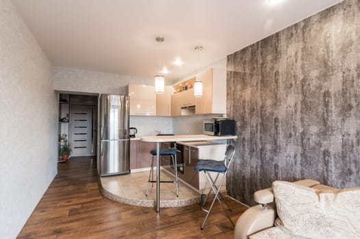 Russia, Moscow- June 11, 2019: interior room apartment. standard repair decoration in hostel. kitchen and dining room