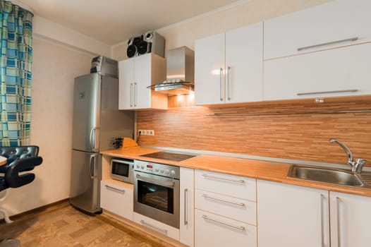 Russia, Moscow- June 11, 2019: interior room apartment. standard repair decoration in hostel. kitchen and dining room