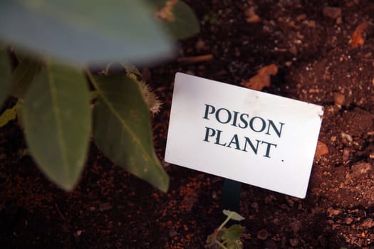 Poison Plan sign