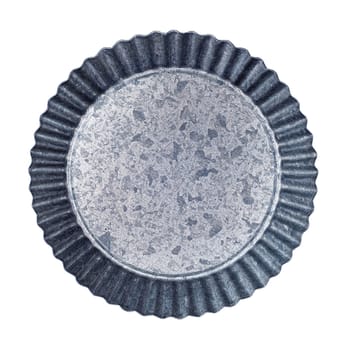 Spotted empty aluminum plate with a wavy edge isolated. Top view