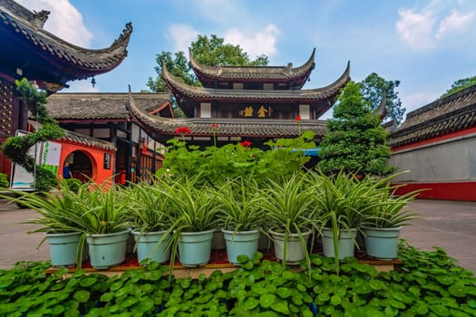 Chengdu, China -  July 2019 :  Plants and flowers in the courtyard of the Buddhist Wenshu Monastery, Sichuan Province