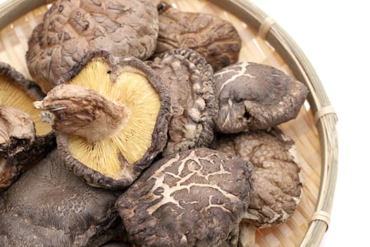 Japanese dried shiitake mushrooms in a bamboo basket