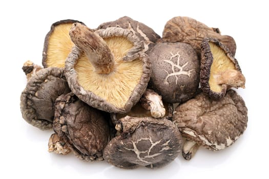 Japanese dried shiitake mushrooms on white background