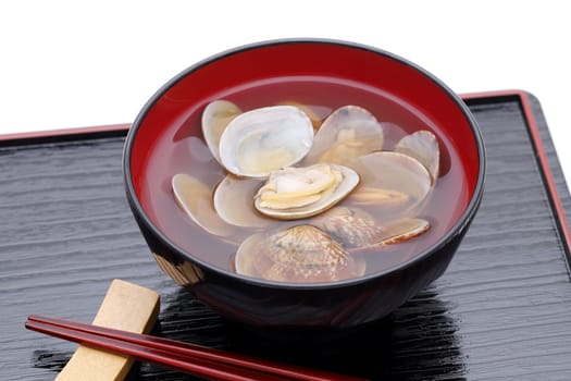 Japanese soy sauce soup with asari clams in a bowl on tray
