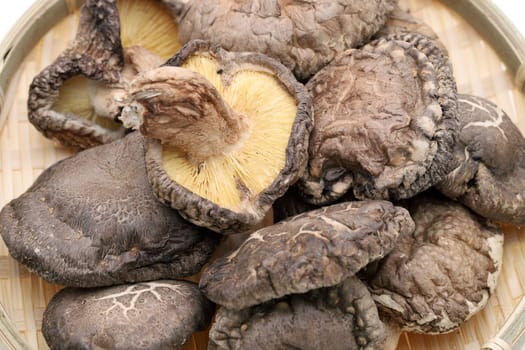 Japanese dried shiitake mushrooms in a bamboo basket