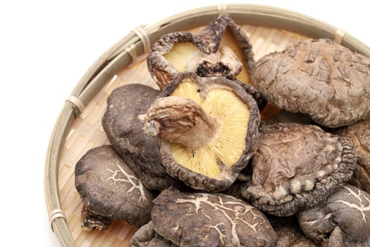 Japanese dried shiitake mushrooms in a bamboo basket