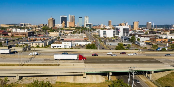 Cars and trucks traverse the urban jungle and maze of highway around downtown Birmingham Alabama