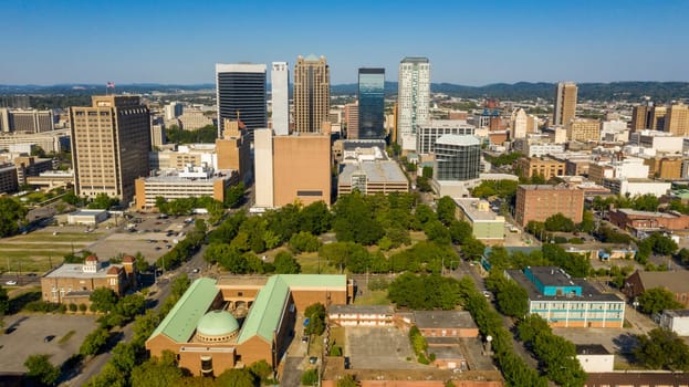 Flags fly over the rooftops and street of the southern downtown Birmingham Alabama
