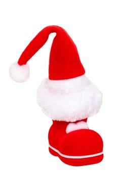 Christmas decorations isolated. Close-up of a red Santa Claus boot with a santa claus hat on it isolated on a white background. Beautiful Christmas design element. Macro.