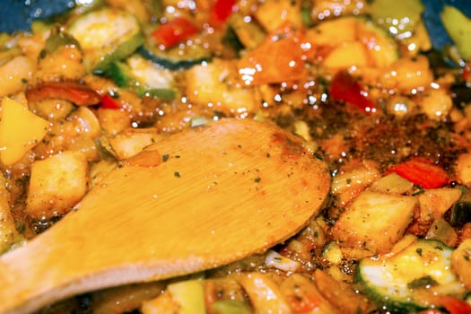 Ratatouille is a French Provencal stewed vegetable dish, originating in Nice. Recipe ingredients include tomato, garlic, onion, zucchini, aubergine (eggplant), bell pepper, and some combination of leafy green herbs common to the region.