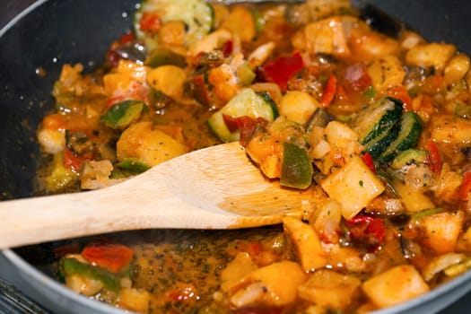 Ratatouille is a French Provencal stewed vegetable dish, originating in Nice. Recipe ingredients include tomato, garlic, onion, zucchini, aubergine (eggplant), bell pepper, and some combination of leafy green herbs common to the region.