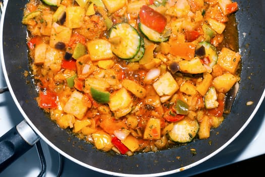 Ratatouille is a French Provencal stewed vegetable dish, originating in Nice. Recipe ingredients include tomato, garlic, onion, zucchini, aubergine (eggplant), bell pepper, and some combination of leafy green herbs common to the region.