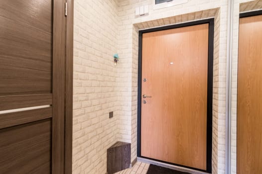 Russia, Moscow- June 11, 2019: interior room apartment. standard repair decoration in hostel. room doors