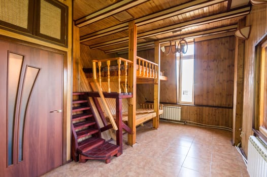 Russia, Moscow- June 11, 2019: interior room apartment. standard repair decoration in hostel. wooden country house