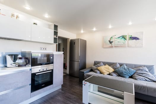 Russia, Moscow- June 11, 2019: interior room apartment. standard repair decoration in hostel. kitchen and dining room