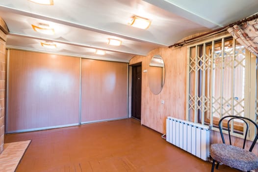Russia, Moscow- June 11, 2019: interior room apartment. standard repair decoration in hostel. wooden country house