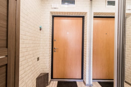 Russia, Moscow- June 11, 2019: interior room apartment. standard repair decoration in hostel. room doors