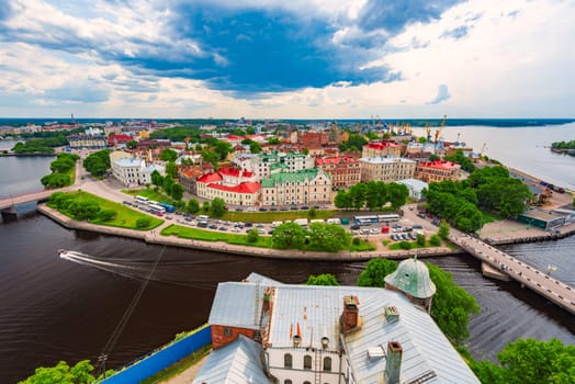 View on Vyborg city from above. Old town in foreground and blue cloudy sky in background. View from Olaf tower.