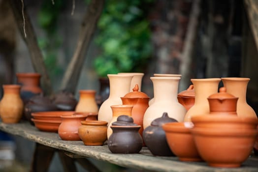 Beautiful handcrafted pottery on table in Russia