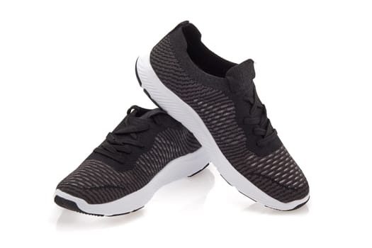 New modern sport running shoes, sneakers or trainers isolated on white background.