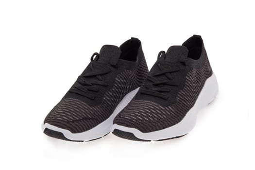 New modern sport running shoes, sneakers or trainers isolated on white background.
