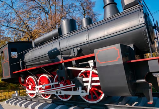 Old railway locomotive. Retro transport. Transport.